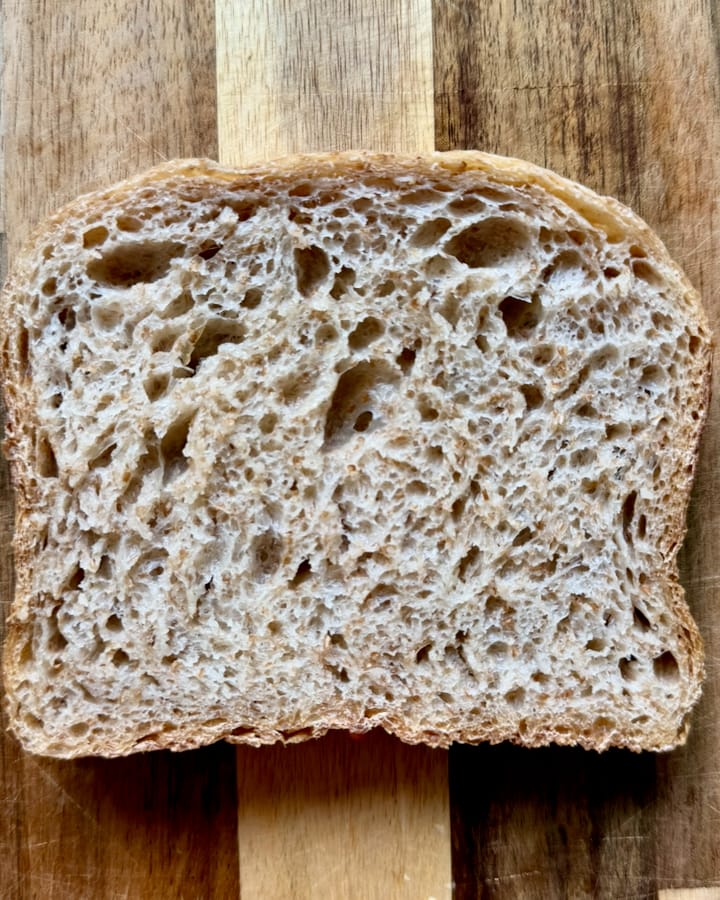 A slice of sourdough sandwich bread seen from above
